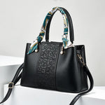 Chic Embossed Leather Handbag with Decorative Scarf Handle ()