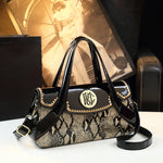 Spring and autumn patent leather snake pattern armpit handbag
