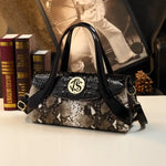 Spring and autumn patent leather snake pattern armpit handbag