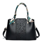 Chic Embossed Leather Handbag with Decorative Scarf Handle ()