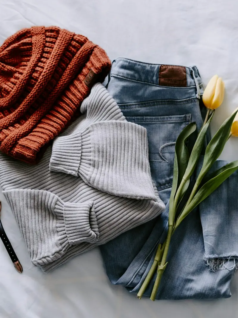 Clothes and a watch laid out